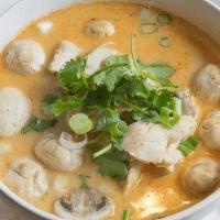 Tom Kha Large · Thai hot and sour soup with coconut milk, galangal, mushrooms, red onion, tomato, kaffir lim...