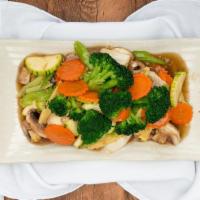 Veggie Delight · Stir fried cabbage, broccoli, zucchini, carrot, mushroom, baby corn and celery in garlic sau...