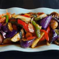 Eggplant Delight · Stir-fried prawns with eggplant, onion, carrot, mushroom, bell pepper, zucchini and basil in...