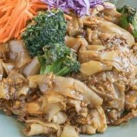 Pad See Ew · Stir fried wide rice noodle with your choice of meat, egg and broccoli in sweet soy sauce.