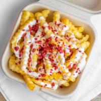 Ranch Fries · Crinkle-Cut Fries with our House-made Ranch Dressing, topped with Bacon Bits. A Tucson Class...