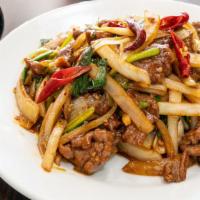 Mongolian Beef  · Hot & spicy. Stir fry beef cook with white onions & scallions in red chili.