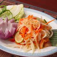 Papaya Salad (Som Tum) Vegetarian · Fresh papaya, carrot, cherry tomato, ground peanut, fresh green bean chili lime dressing