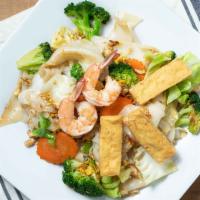 Phad See Lew Our Favorite · Wide rice noodle, stir-fried with light sweet soy sauce, egg, broccoli, carrot, cabbage