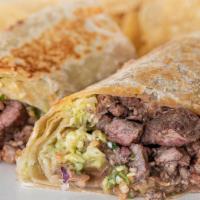 Steak Burrito · Flour tortilla filled with refried beans, mesquite grilled carne asada, diced cabbage, diced...