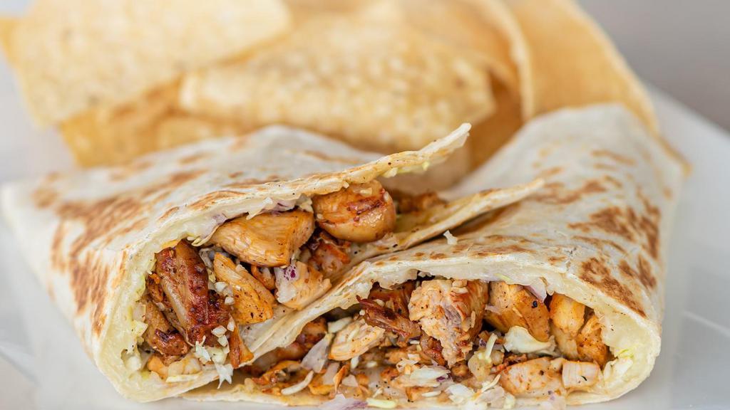 Chicken Quesadilla · Flour tortilla with melted Monterey Jack cheese, mesquite grilled chicken, diced cabbage and diced red onion.