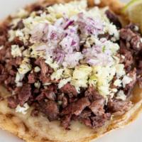 Steak Gordita · Handmade corn tortilla topped with Monterey Jack cheese, mesquite grilled carne asada, diced...