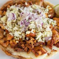 Chicken Gordita · Handmade corn tortilla topped with Monterey Jack cheese, mesquite grilled chicken, diced cab...