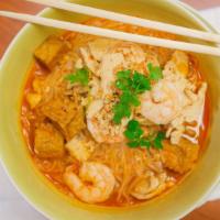 Thai Spicy Noodle Soup · Chicken, shrimp, rice noodles and bean sprouts, in a Thai spicy broth with green onion, cila...
