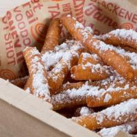 Funnel Cake Fries · Funnel cake goodness in an easy to eat dessert. Sweet funnel cake dough fried to crispy perf...