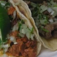 1 Taco · meat options :  spicy pork, fried pork, shredded beef, ground beef, shredded chicken or mari...