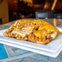 Pork Green Chili Cheese Fries · The city's most underrated pork green chili and cheddar cheese smothered on your choice of f...