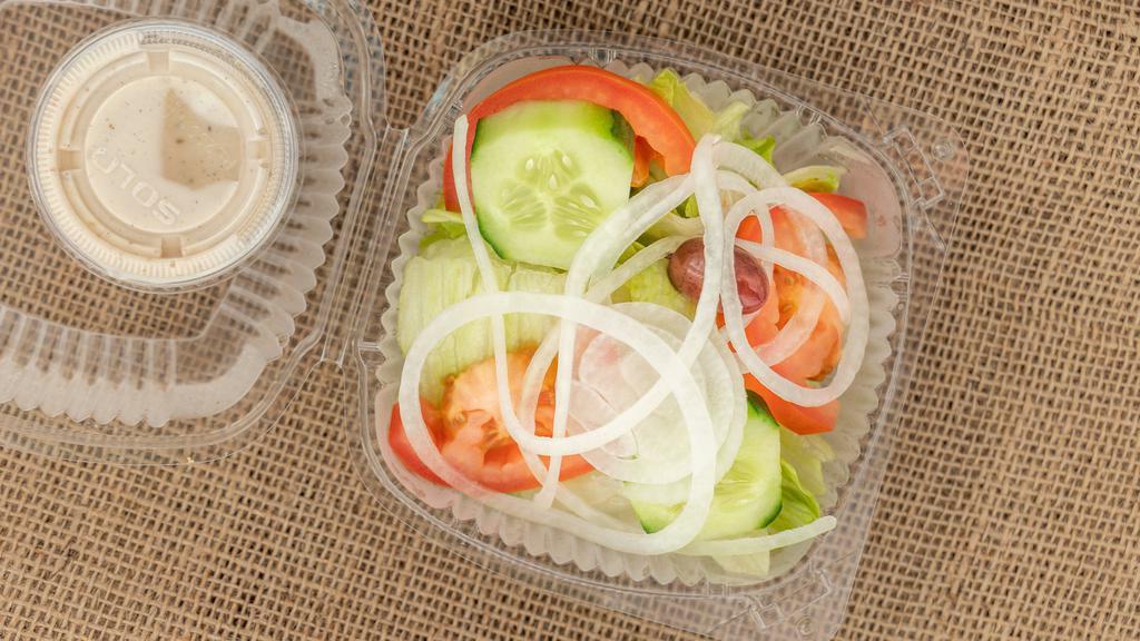 Greek Salad · Lettuce, tomato, cucumber, red onion, kalamata olives, feta.