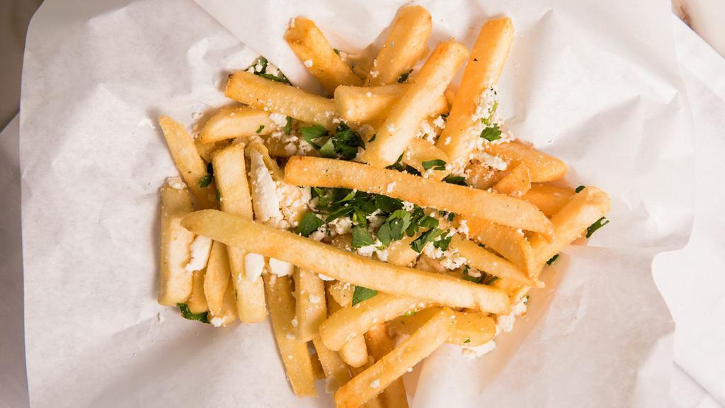 Greek Fries · Our special herbs and spices with feta.