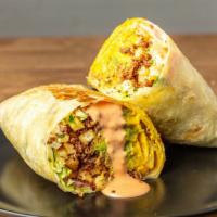 Solár Cali Burrito · Cali Burrito made with Impossible Meat, guacamole, cheese sauce, coleslaw, and fries topped ...