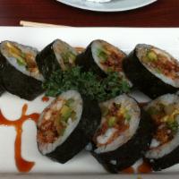 Spider Roll · Soft shell crab, crabmix, and cucumber with sushi rice wrapped in nori.