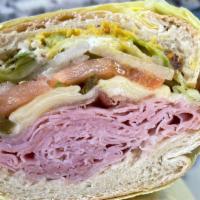 Ham & Swiss · Slow cured ham and swiss cheese made the Brooklyn Style with tomatoes, lettuce, onion, mixed...