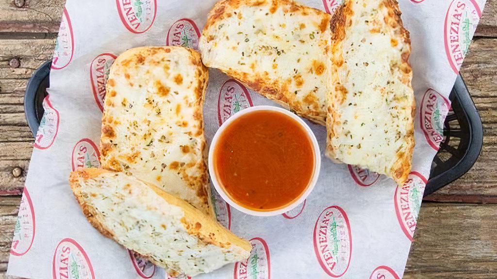 Garlic Bread With Cheese · Served with marinara.