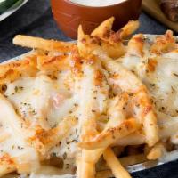 Fries Italian Style · With fresh garlic, melted mozzarella, parmigiana and oregano, served with ranch and ketchup.