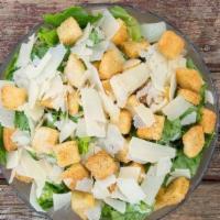 Caesar Salad · Our wonderful caesar dressing, mixed greens, croutons, and shaved Parmigiana.