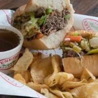 Italian Beef · Roast beef, green pepper, onions and giardiniera peppers, au jus sauce and mozzarella or pro...