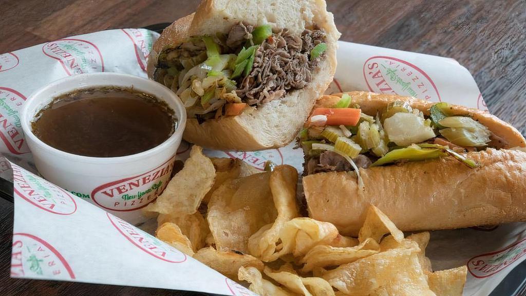 Italian Beef · Roast beef, green pepper, onions and giardiniera peppers, au jus sauce and mozzarella or provolone cheese for additional price.
