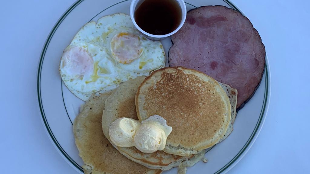 Pancake Breakfast · 2 Buttermilk Pancakes, Bacon, Sausage or Ham and 2 Eggs