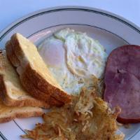 Hideaway Breakfast · 2 Eggs, Bacon, Sausage or Ham w/ Hash Browns and toast