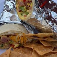 Breakfast Burrito · Scrambled Eggs, Green Peppers, Onions, Cheese and Choice of Bacon, Sausage or Ham served wit...