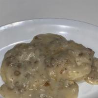 1/2 Order Biscuits And Gravy · 1 Buttermilk Biscuit smothered in Country Gravy