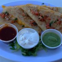 Cheese Quesadilla · Melted cheese and a crisp tortilla. Additional charge extra if you want to add Chicken or St...