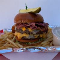 The Beast Burger · (2)  1/2  Lb. Burger patties, Pastrami, Bacon, Swiss and American Cheese