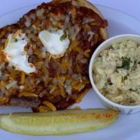 Chili Cheeseburger · Open Faced bun smothered with chili, cheese and onions.