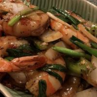 Black Pepper Tiger Prawn · Tiger prawns sauteed in a homemade black pepper sauce with onion, bell peppers, and young pe...