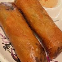 Chicken Egg Rolls (2 Pieces) · Golden fried spring rolls stuffed with crystal noodles, cabbage, carrots, and chicken served...