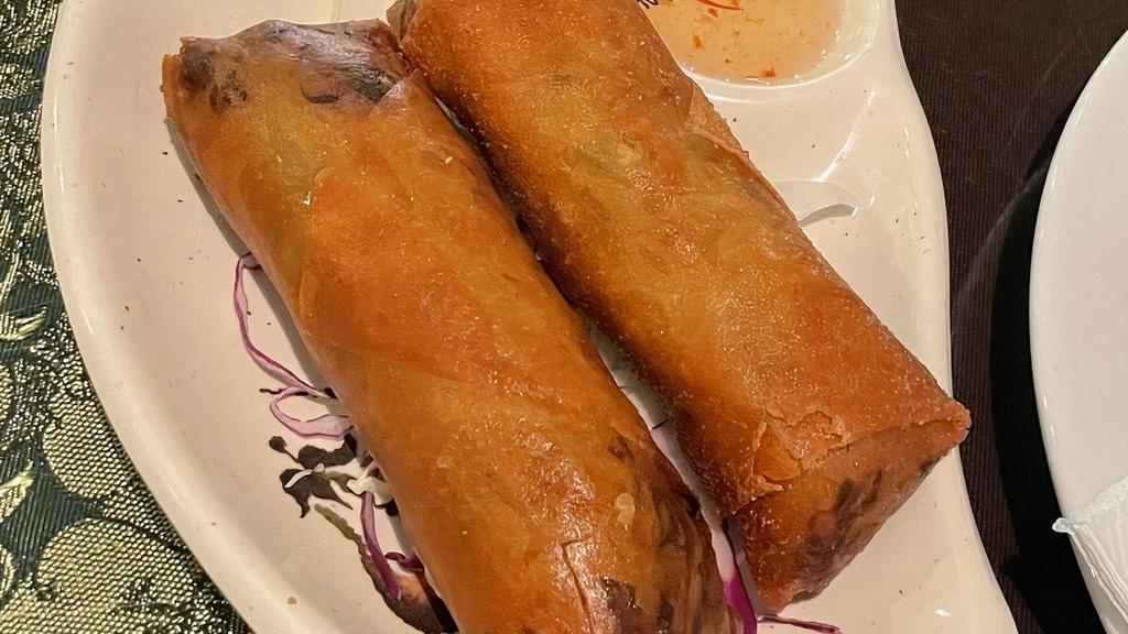 Chicken Egg Rolls (2 Pieces) · Golden fried spring rolls stuffed with crystal noodles, cabbage, carrots, and chicken served with plum sauce.