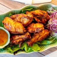 Bua Chicken Wings (4 Wings) · Boneless chicken wings with Bua’s house marinade served with sweet chili sauce.