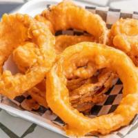 Onion Rings · Beer-battered and hand-dipped onion rings, 100% vegan!