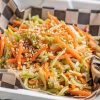 Coleslaw · Shredded cabbage and carrots tossed in a light vinaigrette
