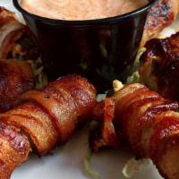 Grilled Jalapeños Poppers · Fresh jalapeños served open-faced, filled with jalapeño cream cheese & wrapped with bacon. S...
