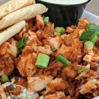Crispy Buffalo Chicken Salad · Hand-breaded chicken tenders diced and tossed in buffalo sauce. served over fresh romaine wi...