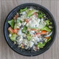 Greek Salad · Feta, cucumber, tomato, onion, and black olive. Includes romaine lettuce, croutons, and a dr...