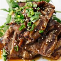 Teriyaki Beef · Grilled marinated short rib (bone in.)
