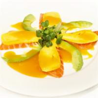 Salmon & Mango New Style · Salmon topped with mango, avocado & mango sauce