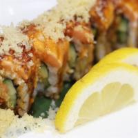 Bangkok Roll · Crab, cucumber & avocado topped with seared salmon, crunch & eel sauce