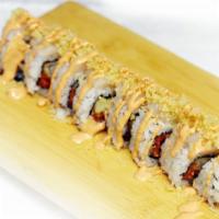 White Dragon · Shrimp tempura, spicy tuna topped with scallop, crunch & spicy mayo