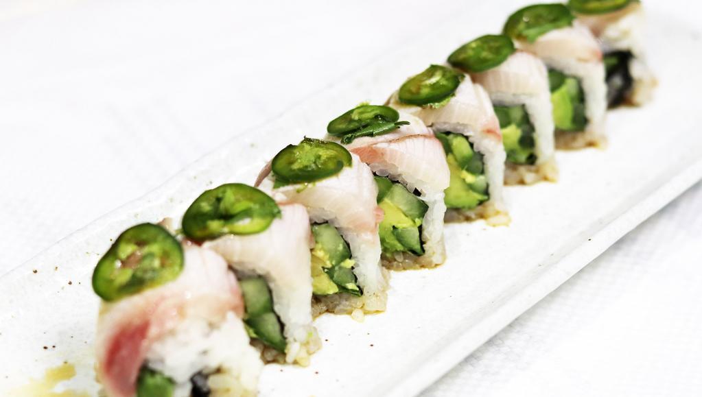 Aburi Hamachi Roll · Cucumber, avocado, asparagus, oba topped with seared hamachi, jalapeno & cilantro.