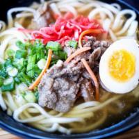 Niku Udon · Thick Japanese udon 
noodle  with sauteed beef