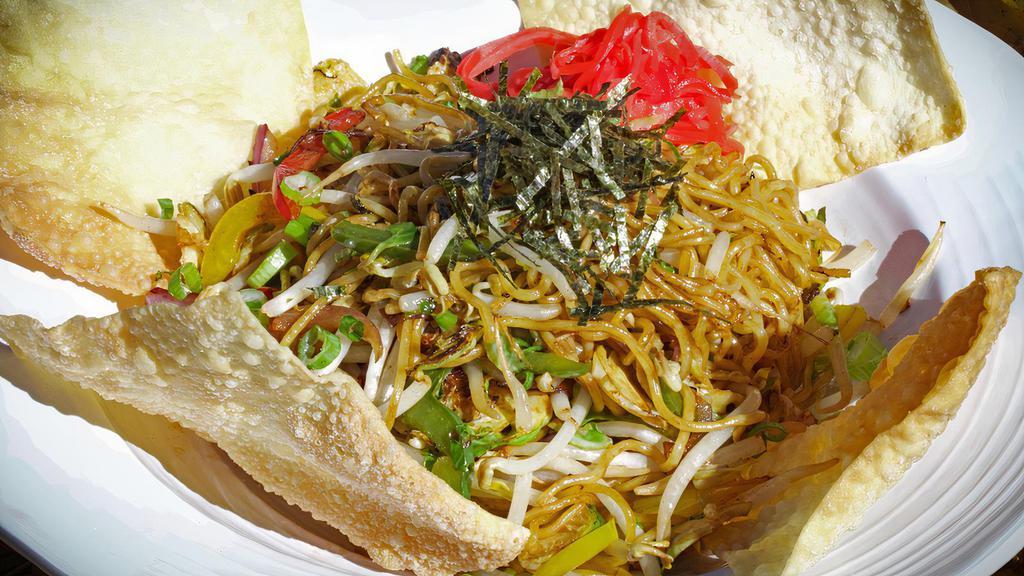 Yaki Soba · Stir fried egg noodles with cabbage, bi-colored peppers & bean sprouts.