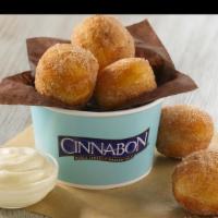 Cinnasweeties™ · Bite-sized doughnut treats, rolled in our famous Cinnamon sugar. Add an extra cup of frostin...